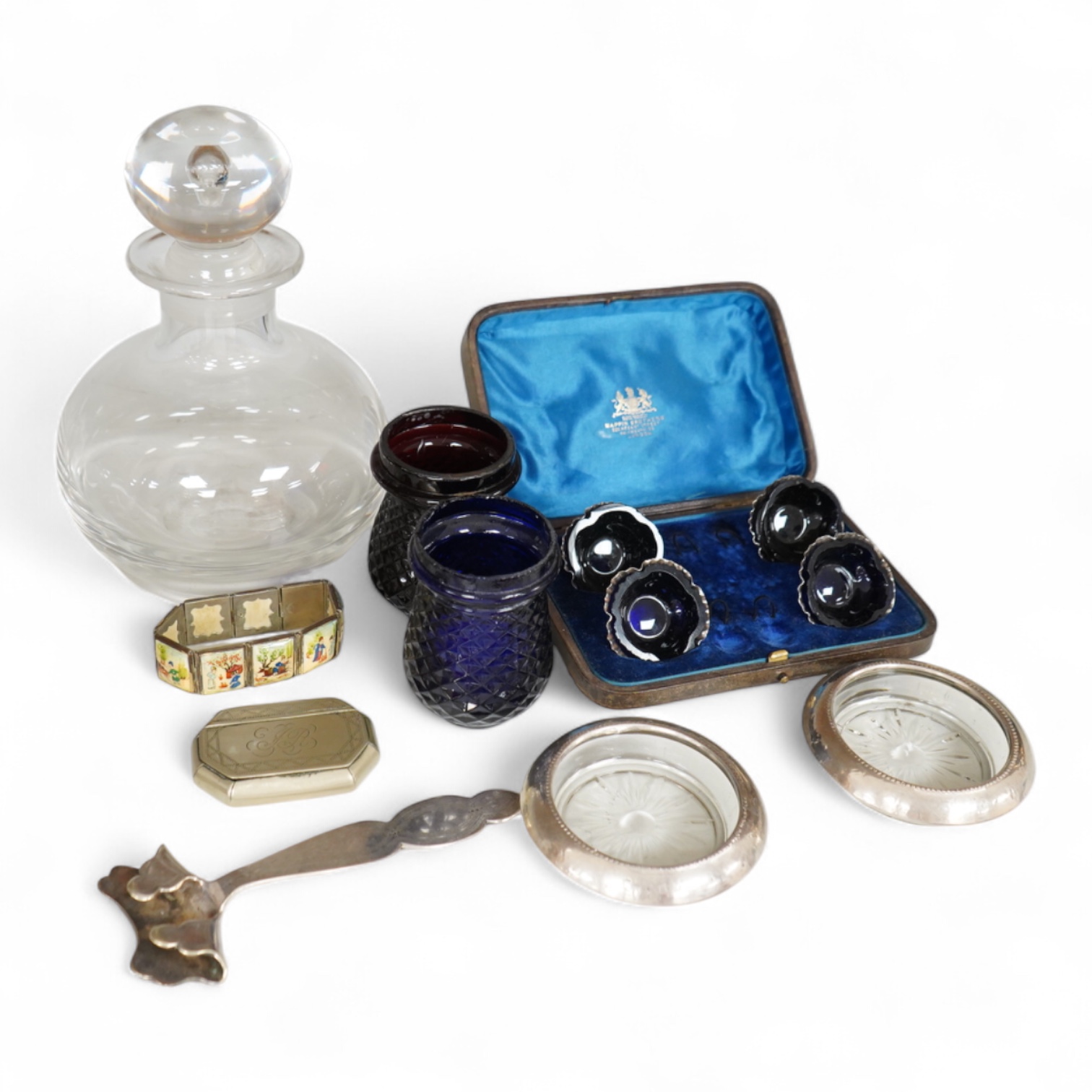 Sundry items to include a cased set of silver salts with glass liners, a Persian panelled bracelet and a glass decanter, largest 23cm high